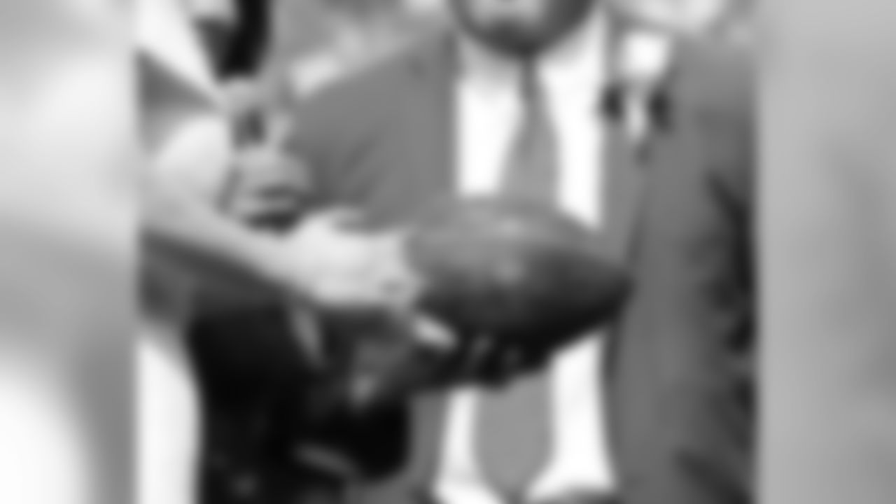 The Buffalo Bills celebrate the marriage of Mackenzie Park and Jordan Binggeli, the winning couple from the ÒHalftime Wedding Experience of a LifetimeÓ contest, at New Era Field on September 29, 2019.