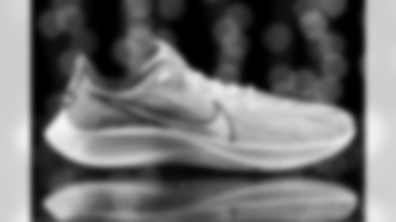 Sean McDermott's cleats in support of Food Allergy Awareness & Skin Cancer Prevention. The Buffalo Bills My Cause My Cleats studio session on December 2, 2021. Photo by Ben Green