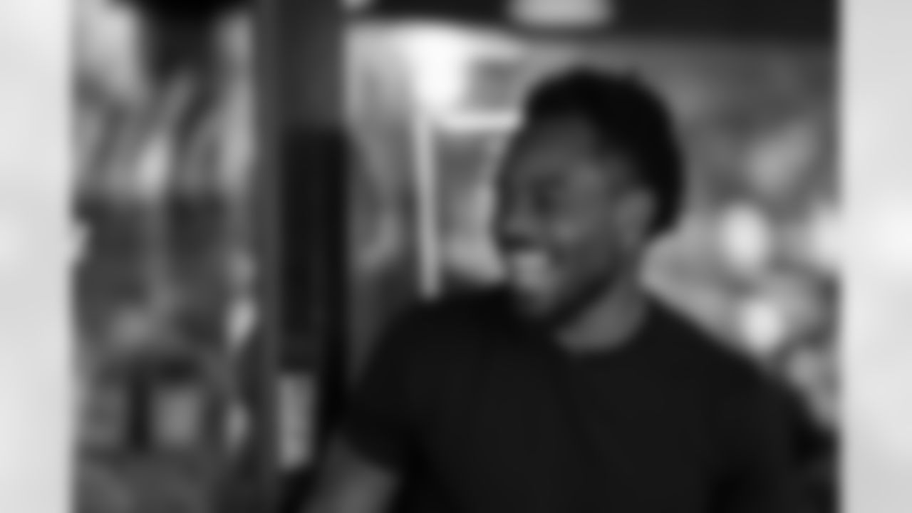 Isaiah McKenzie laughs with customers at his restaurant during the 2022 off-season in Miami, Florida. Photo by Ben Green