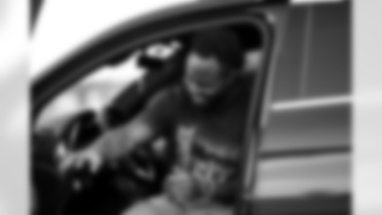 Isaiah McKenzie gets into his car on the way to mobility training during the 2022 off-season in Miami, Florida. Photo by Ben Green