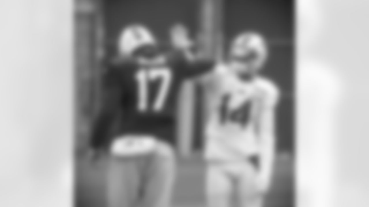 Stefon Diggs (14) and Josh Allen (17) handshake. Buffalo Bills Week 12 practice, November 24, 2020.
Photo by Bill Wippert