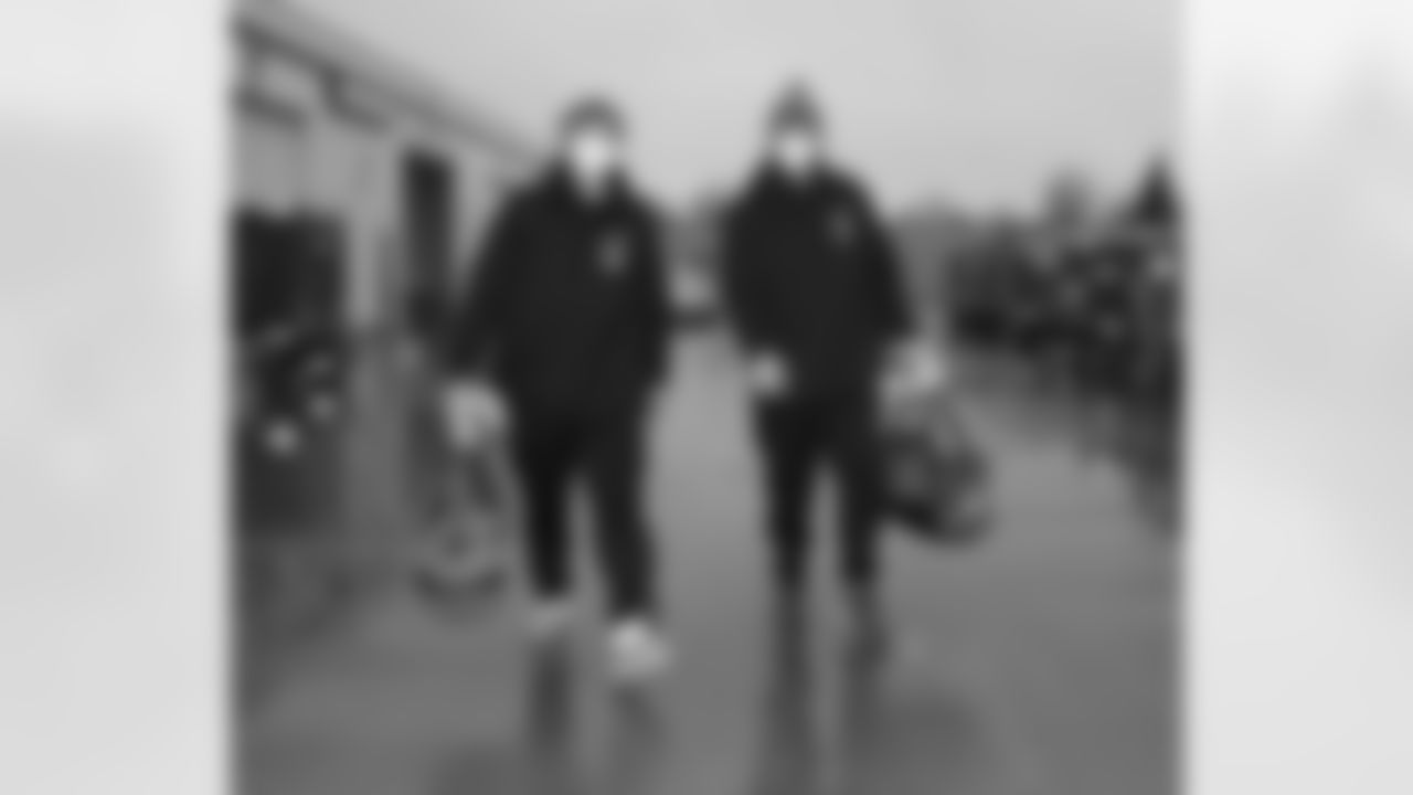 Jacob Capra (66) and Evin Ksiezarczyk (67). Buffalo Bills depart for New England, December 25, 2021.
Photo by Bill Wippert