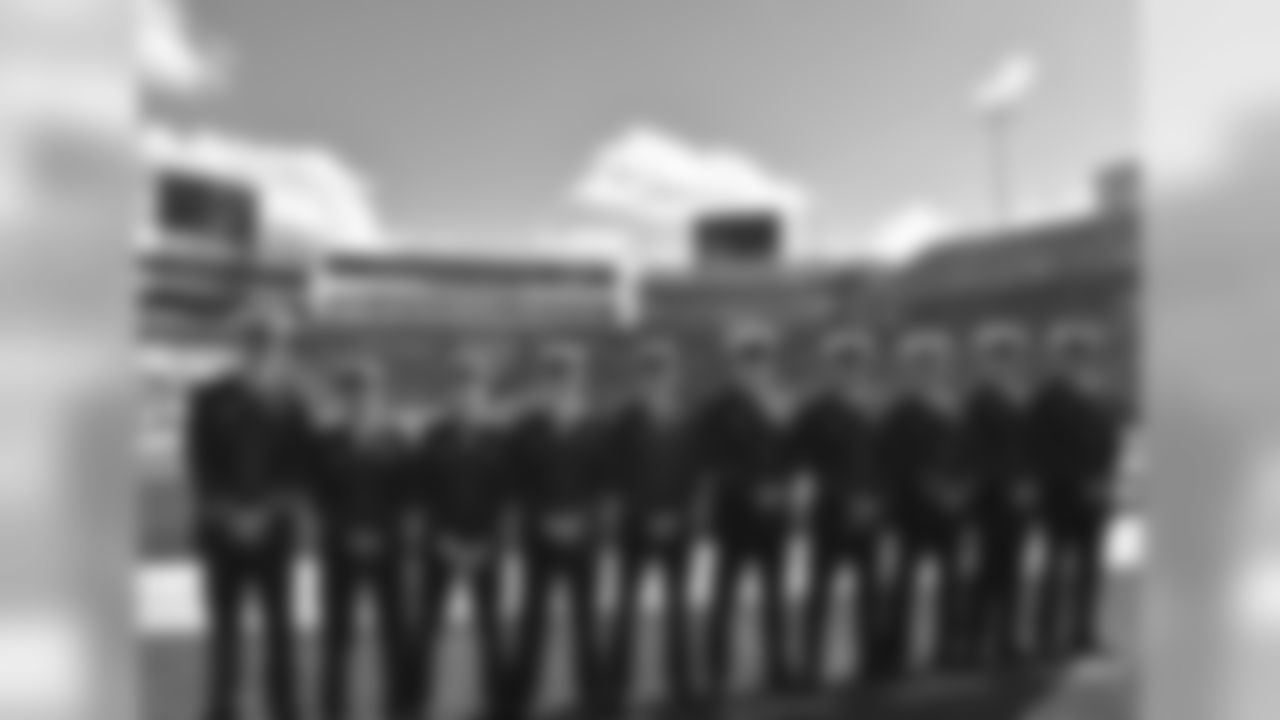 Members of the United States military standing on the field at Ralph Wilson Stadium, on Salute to Service gameday 2015.