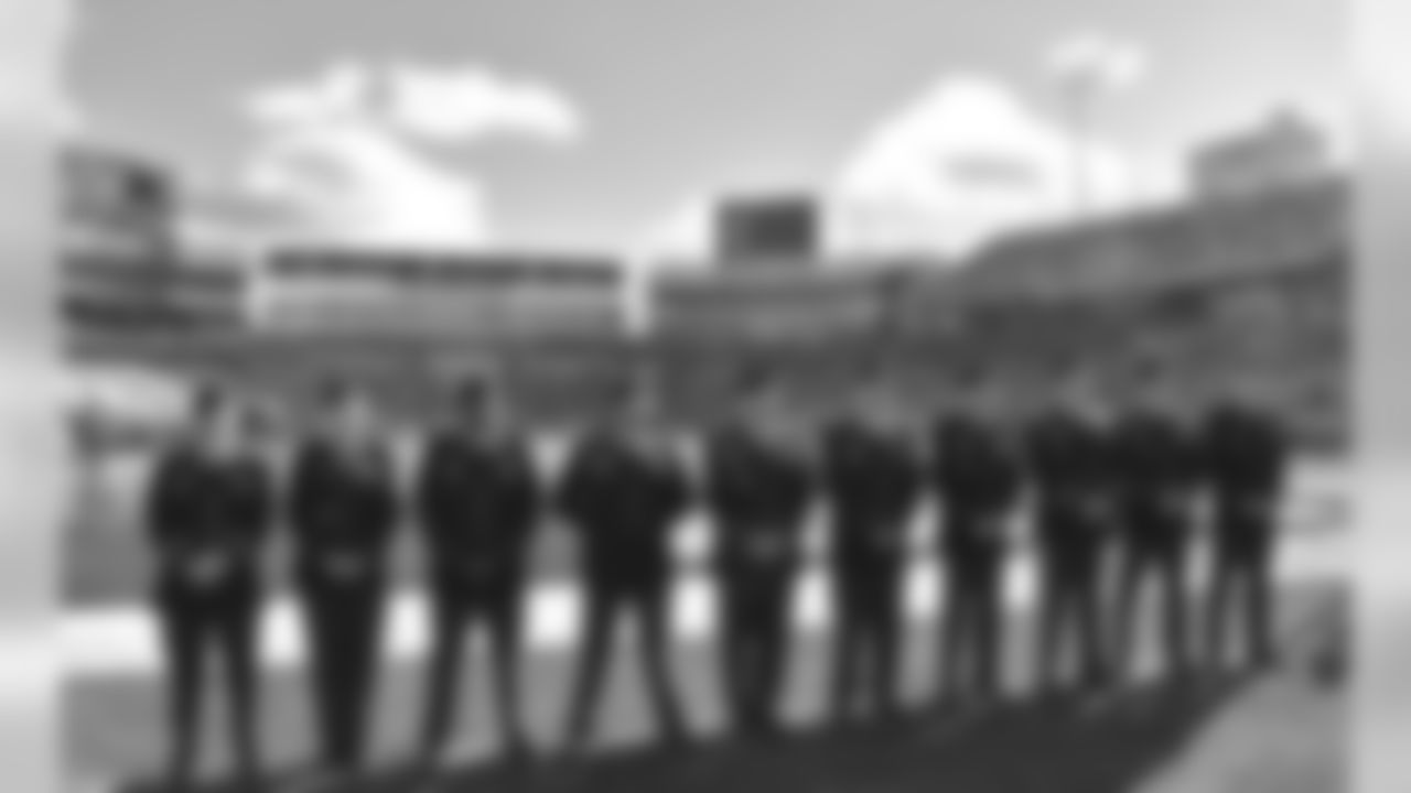 Members of the United States military standing on the field at Ralph Wilson Stadium, on Salute to Service gameday 2015.
