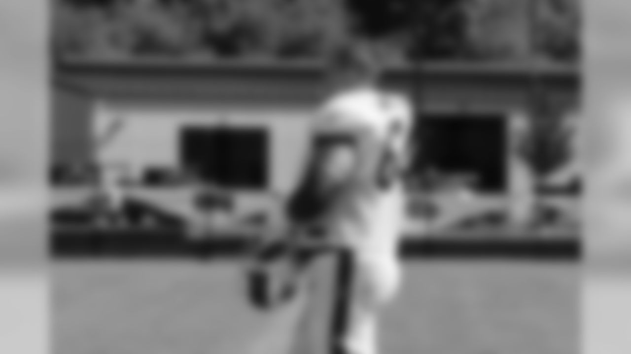 Offensive guard Richie Incognito (64) looks onto the action during practice.
