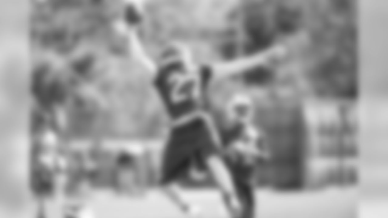 Bills safety Duke Williams leaps into the air for a one-handed reception, during Week 2 of OTAs.