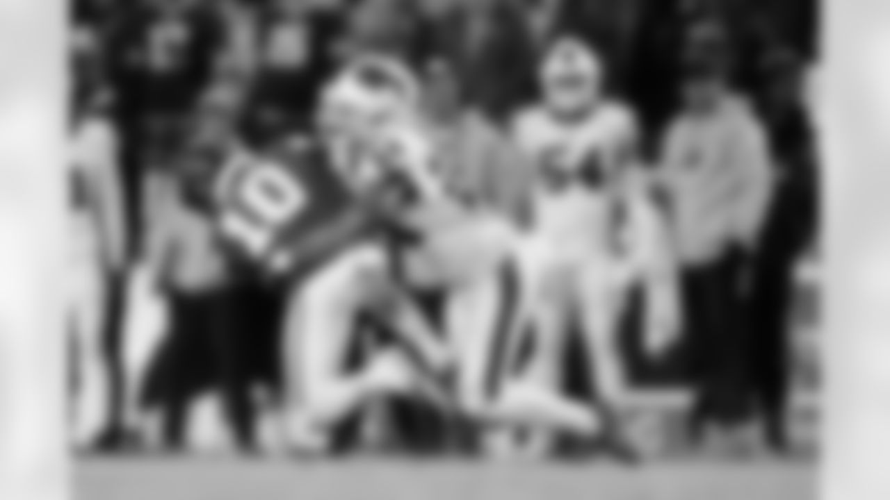 Taron Johnson (24) makes a tackle. Buffalo Bills vs Kansas City Chiefs - AFC Divisional Playoff game at GEHA Field at Arrowhead Stadium, January 23, 2022. Photo by Ben Green