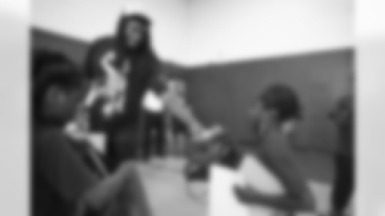 Tremaine Edmunds hands out shoes and school supplies at the Boys and Girls Club of Buffalo, Masten Club House, on August 15, 2022. Photo by Ben Green