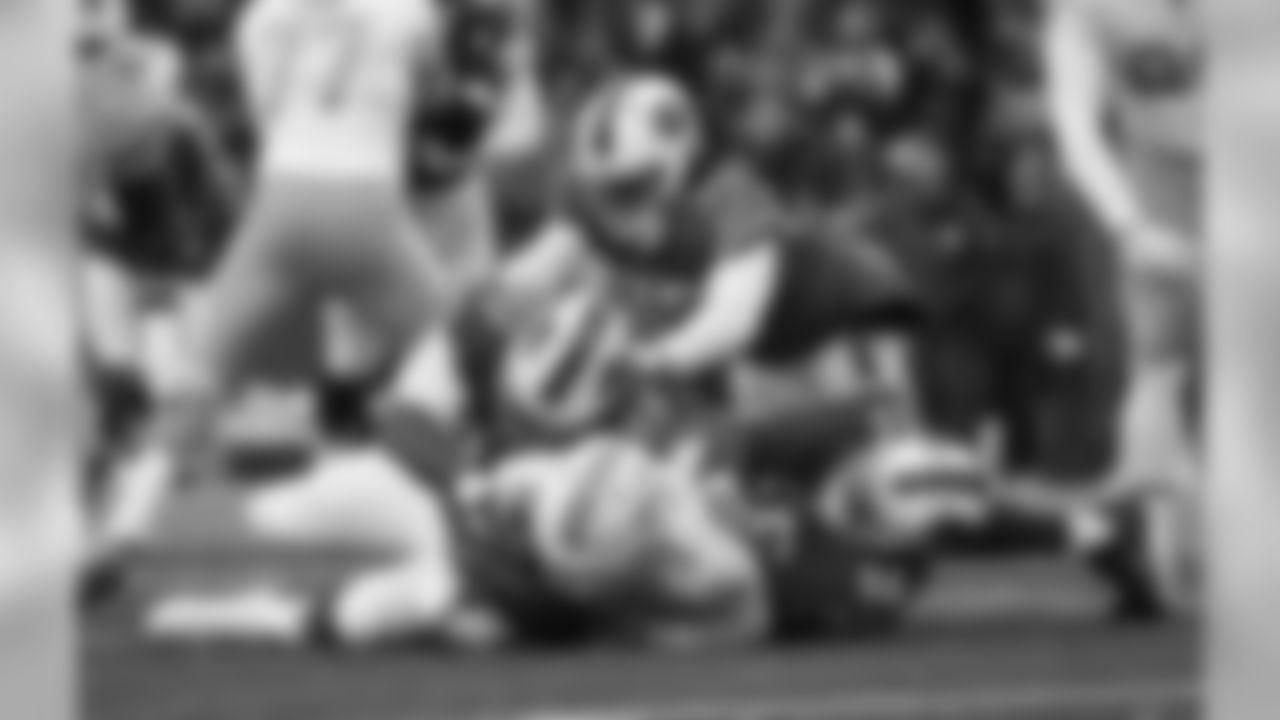 Ryan Davis (No. 56), Adolphis Washington (No. 92) and Cap Capi (No. 75) - Week 15 vs. Miami