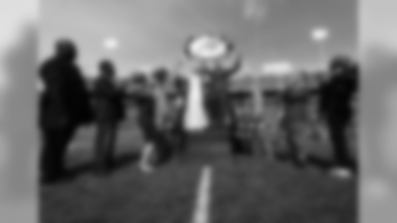 The Buffalo Bills celebrate the marriage of Mackenzie Park and Jordan Binggeli, the winning couple from the ÒHalftime Wedding Experience of a LifetimeÓ contest, at New Era Field on September 29, 2019.