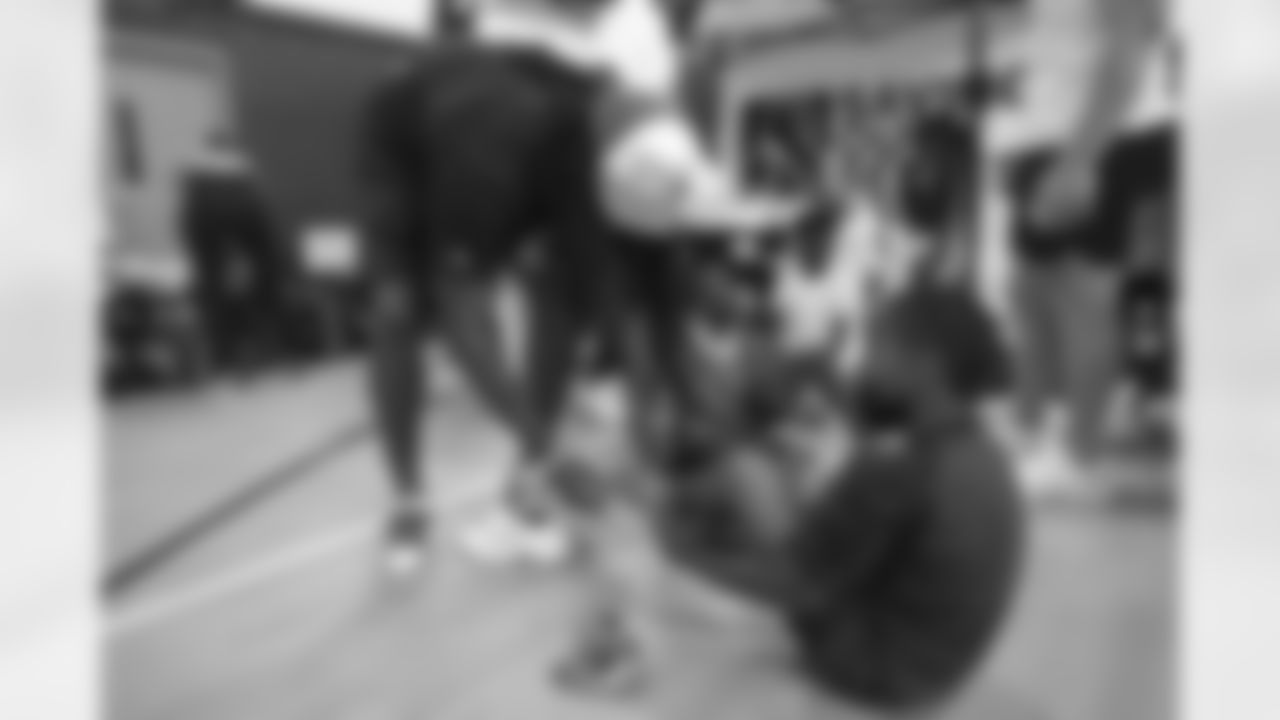 Tremaine Edmunds hands out shoes and school supplies at the Boys and Girls Club of Buffalo, Masten Club House, on August 15, 2022. Photo by Ben Green
