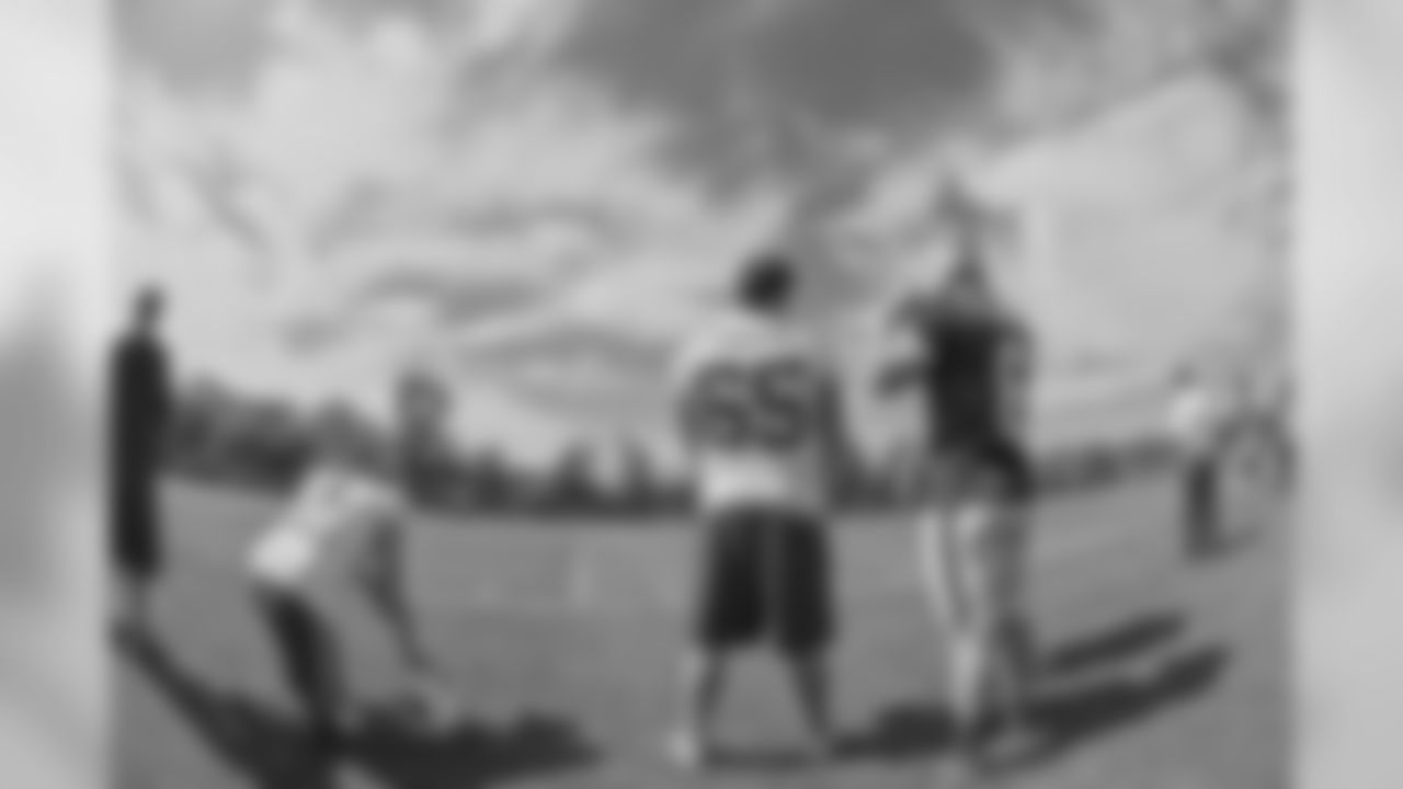 Bills long snapper Garrison Sanborn chats on the sideline with punter Colton Schmidt, during Week 2 of OTAs.