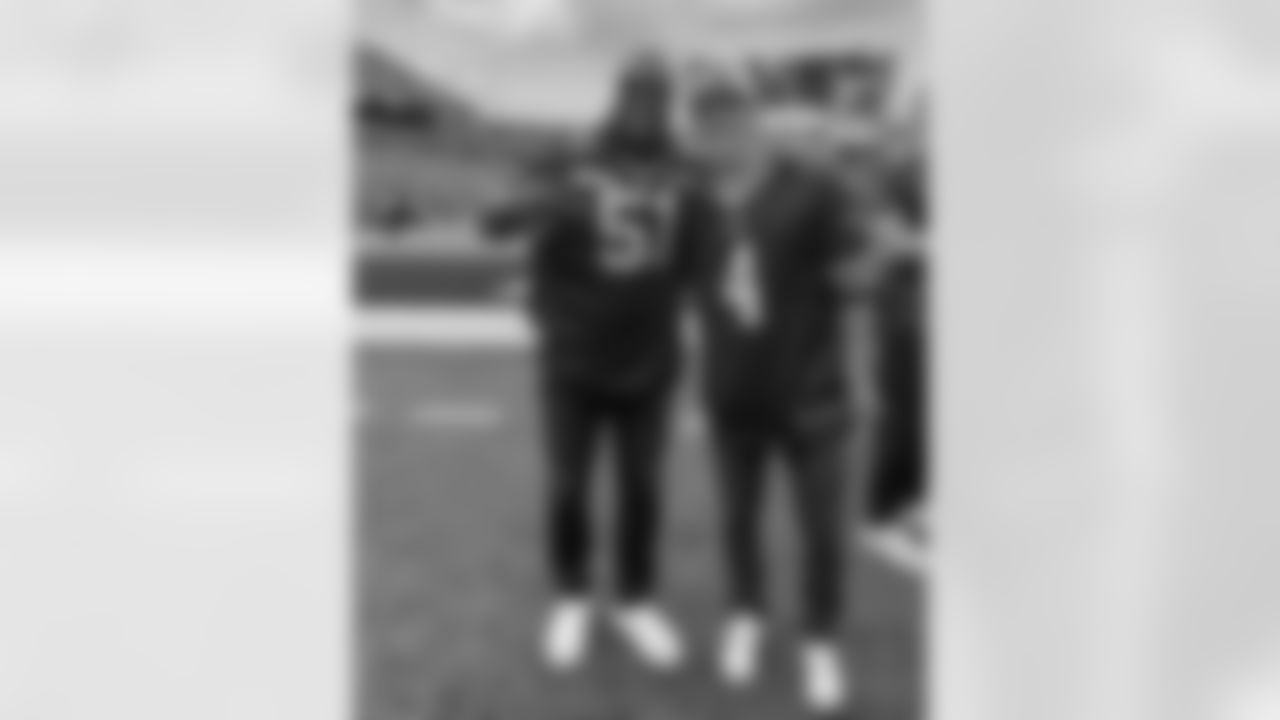 Takeo Spikes with Mitch Marner from the Toronto Maple Leafs