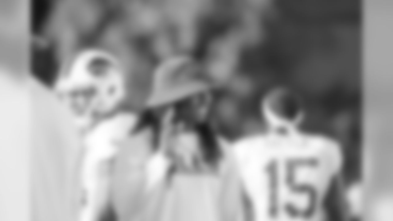 Wide receiver Sammy Watkins waves at a fan.