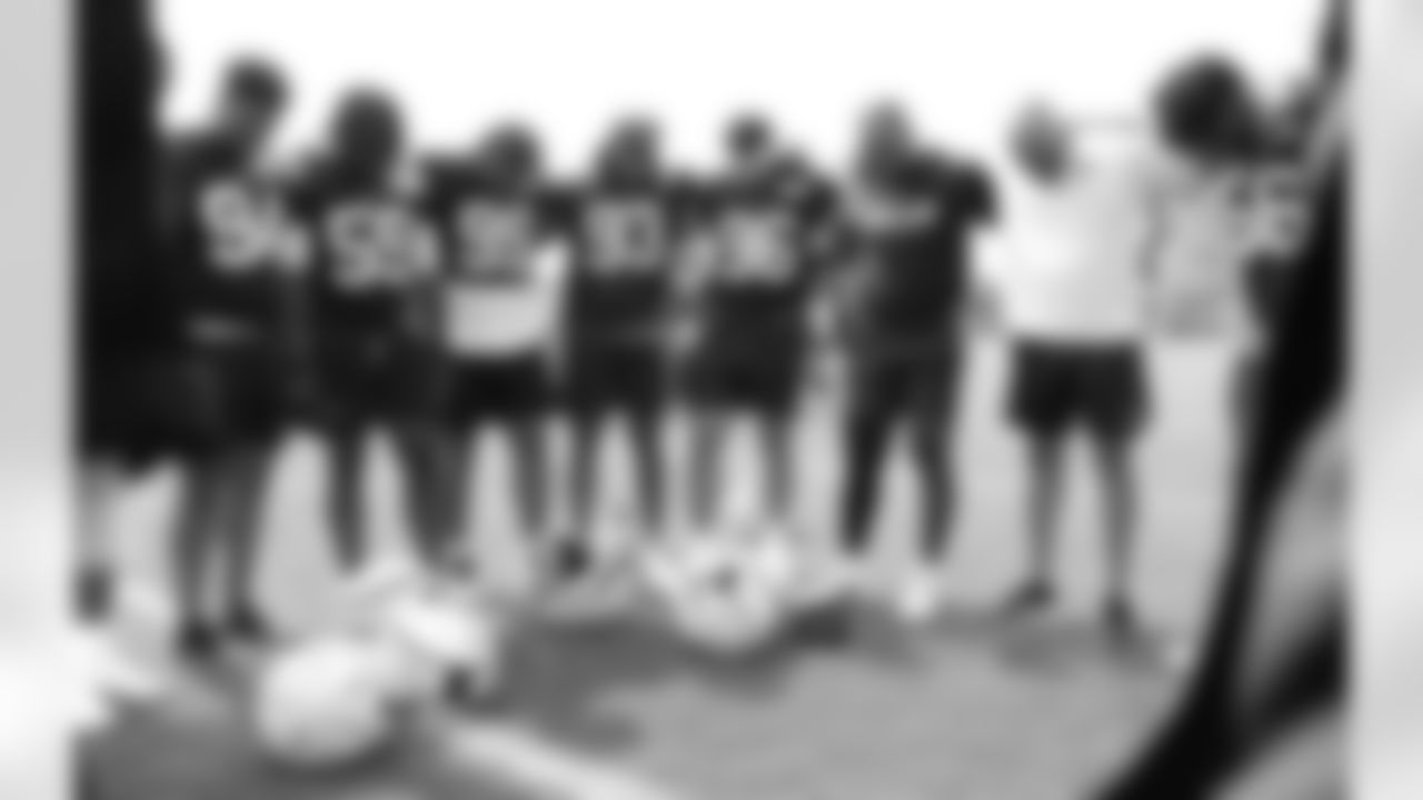 Post practice with Cortez Broughton (94), Kingsley Jonathan (59), Tim Settle (99), Kendal Vickers (93), Kameron Cline (96), Von Miller, Eric Washington, Leonard Floyd (56). Buffalo Bills open Training Camp at St. John Fisher University, July 26, 2023.