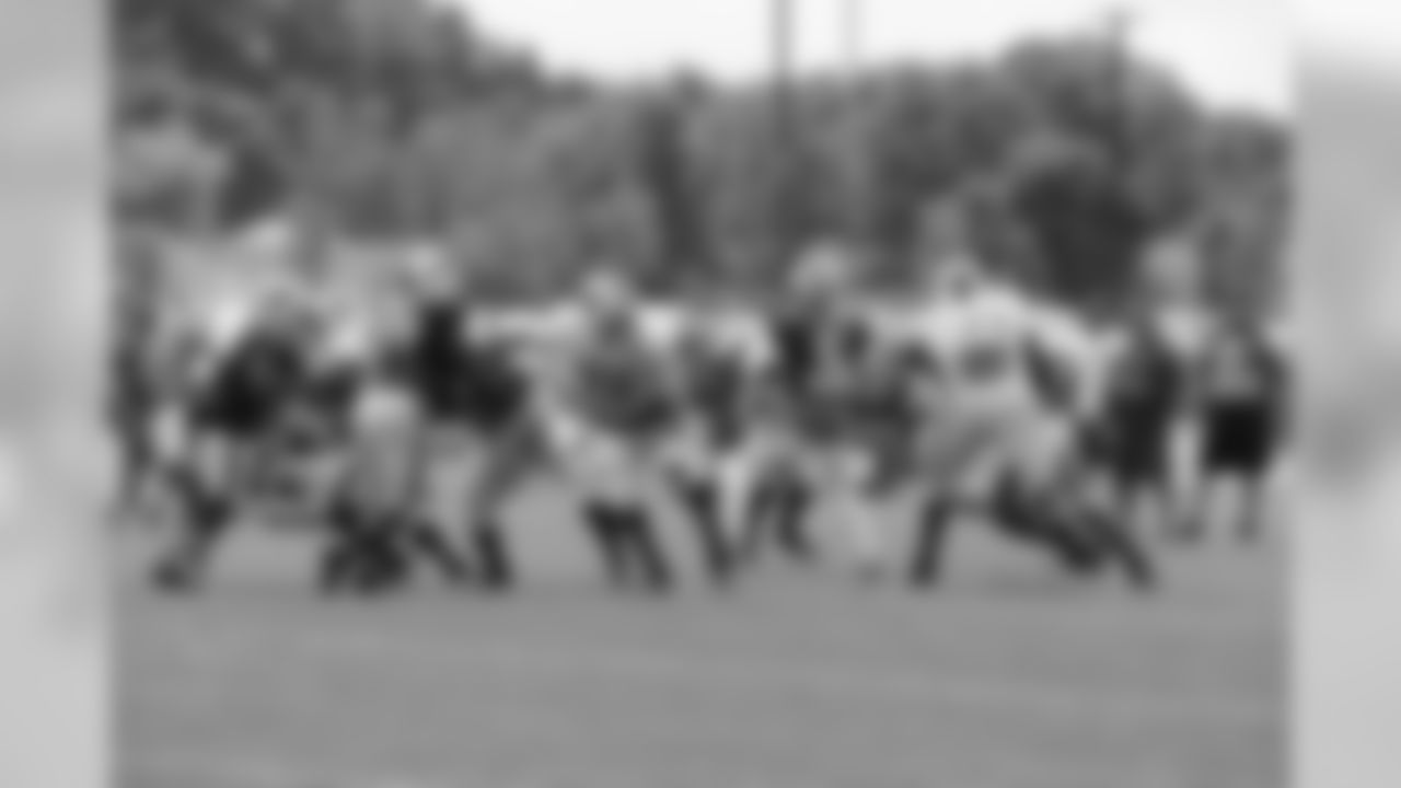 The team runs a play during practice.