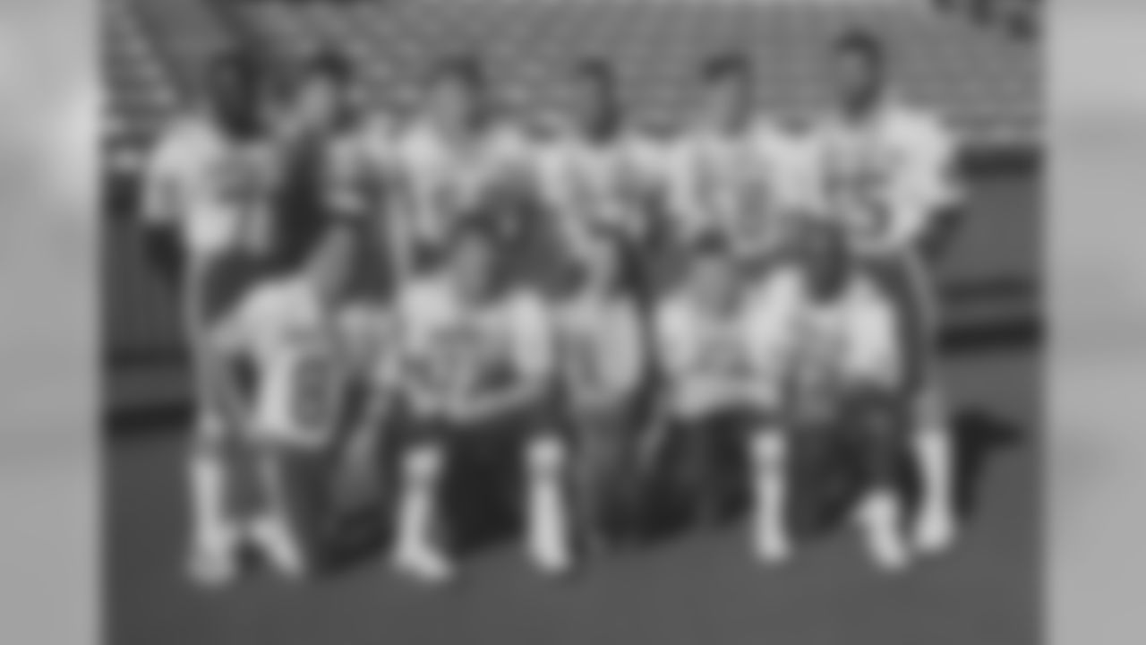 Back Row (L to R): DE Bruce Smith, C Kent Hull, T Will Wolford, LB Cornelius Bennett, LB Shane Conlan, LB Darryl Talley. Front Row (L to R): WR Andre Reed, QB Jim Kelly, WR Steve Tasker, RB Thurman Thomas (1990).