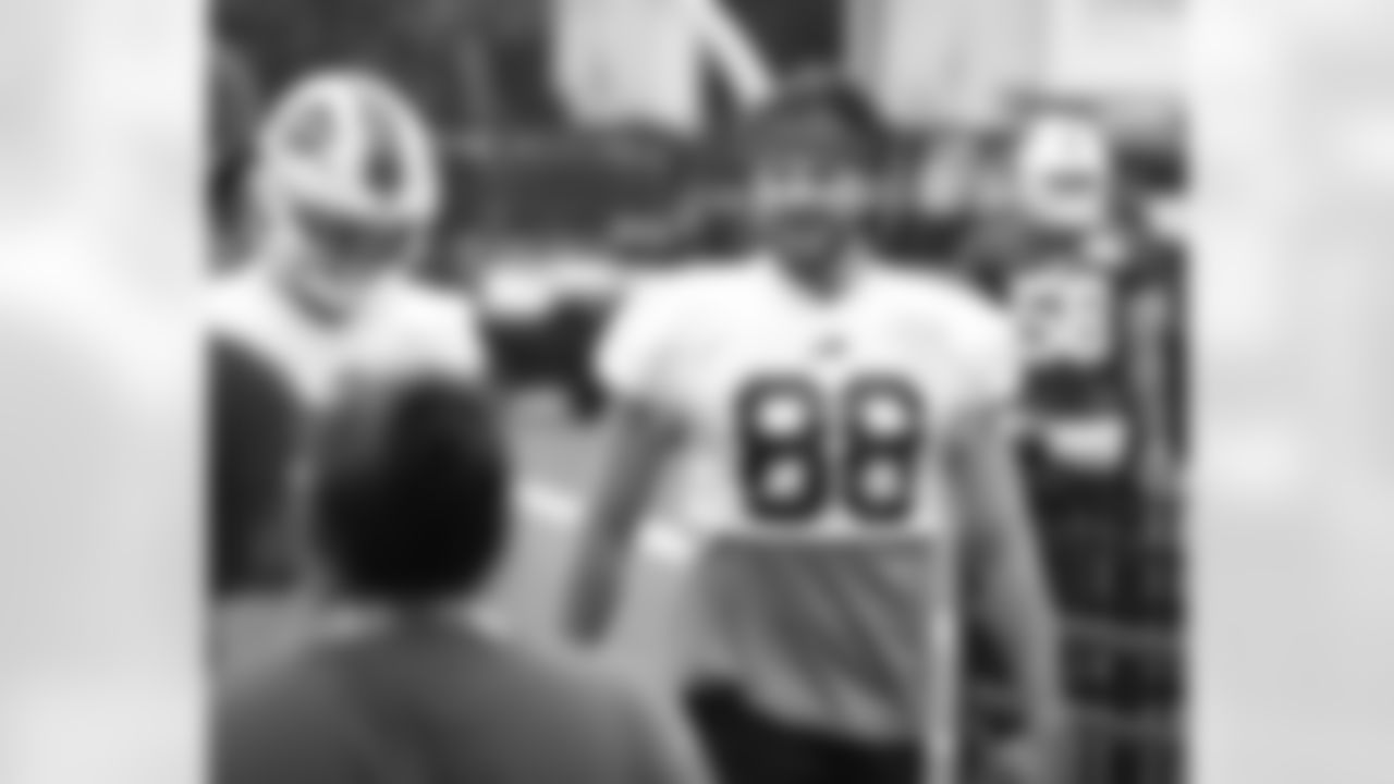 Dawson Knox (88) greets fans at Buffalo Bills Training Camp at St. John Fisher University, August 10, 2023.