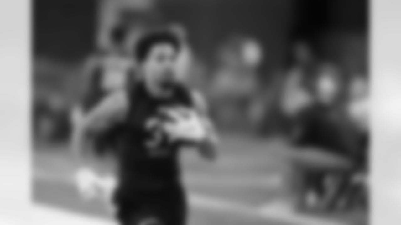 Boise State wide receiver Khalil Shakir runs a drill during the NFL football scouting combine, Thursday, March 3, 2022, in Indianapolis. (AP Photo/Darron Cummings)