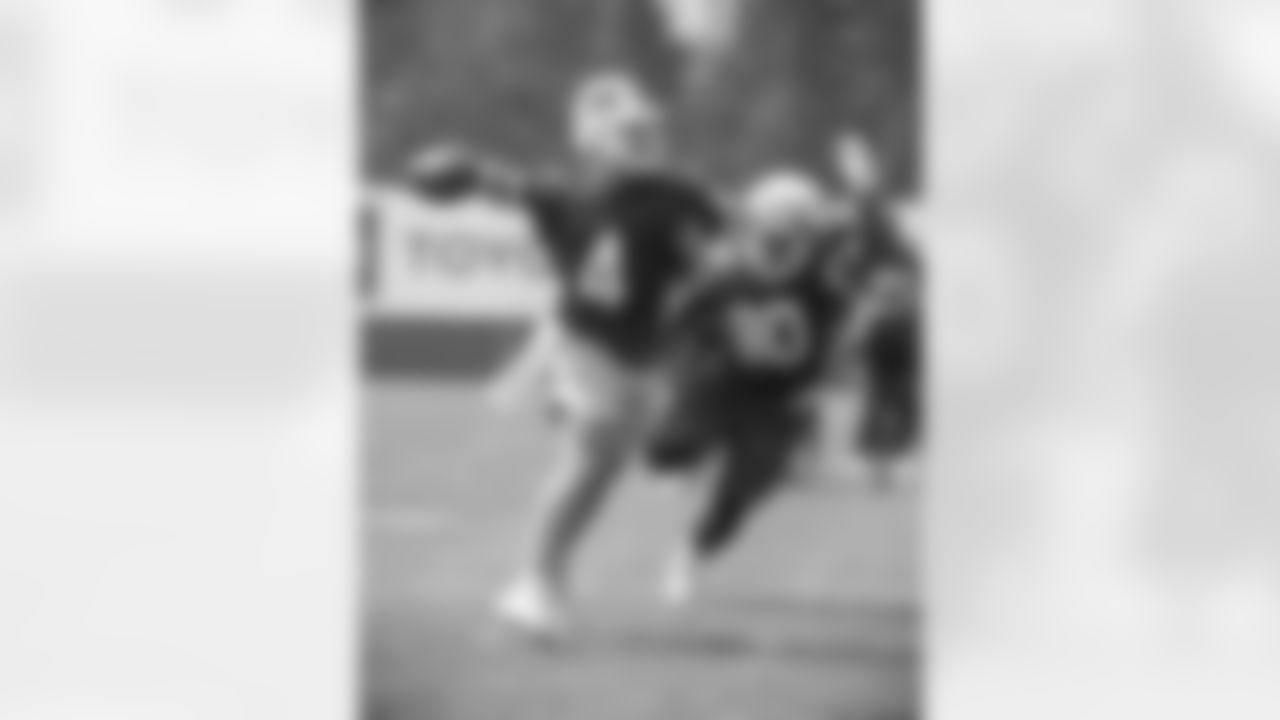 Jake Fromm (4), Brandin Bryant (90). Buffalo Bills Training Camp. July 28, 2021. Photo by Bill Wippert