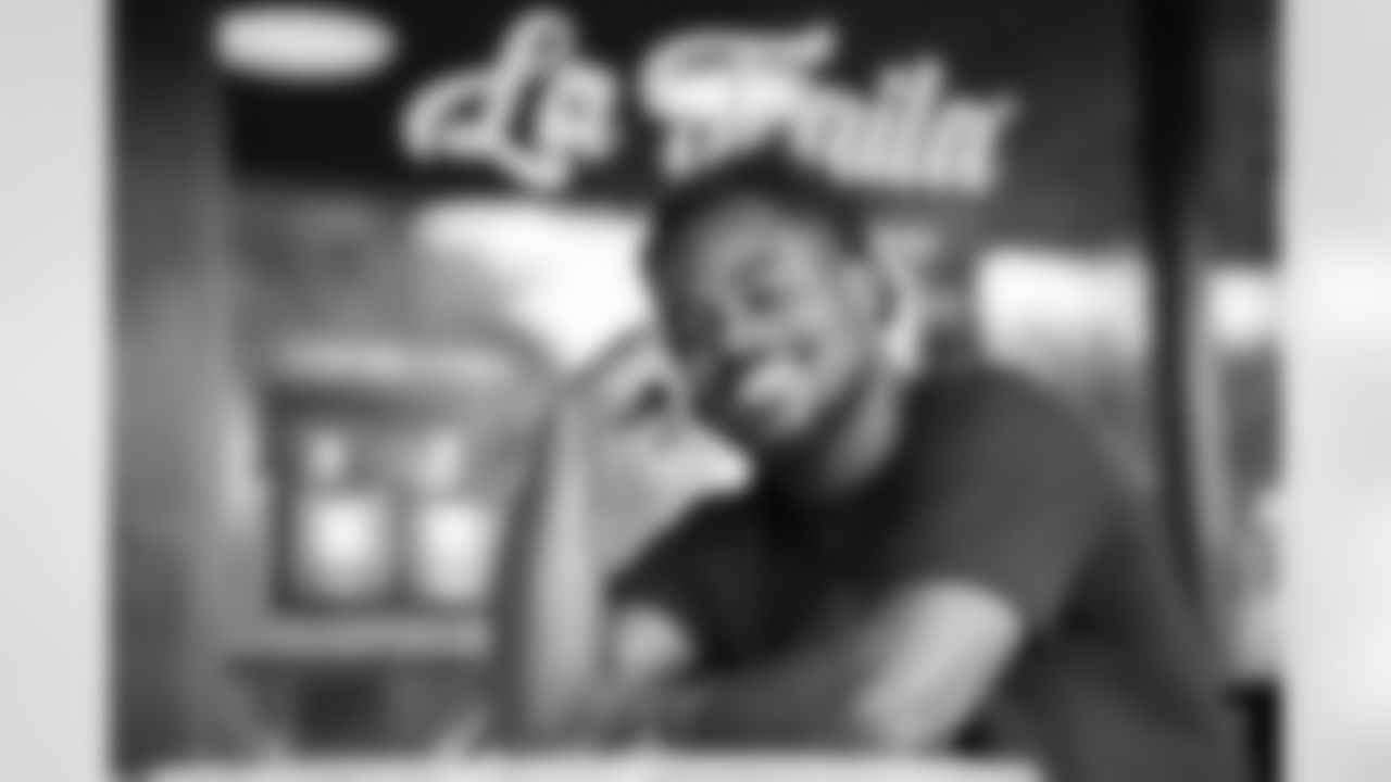 Isaiah McKenzie works at his restaurant, La Traila in Miami, Florida. An idea that began during COVID with close friend Mel Rodriguez has now turned into a growing hospitality business. When McKenzie isn't training or coaching flag football, you can find him working at the restaurant and interacting with customers. Photo by Ben Green