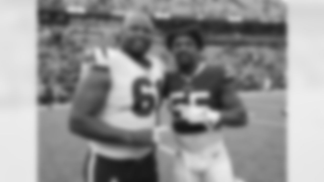 Marcus Cannon (61) and Jerry Hughes (55) Buffalo Bills vs Houston Texans at Highmark Stadium, October 3, 2021. Photo by Bill Wippert