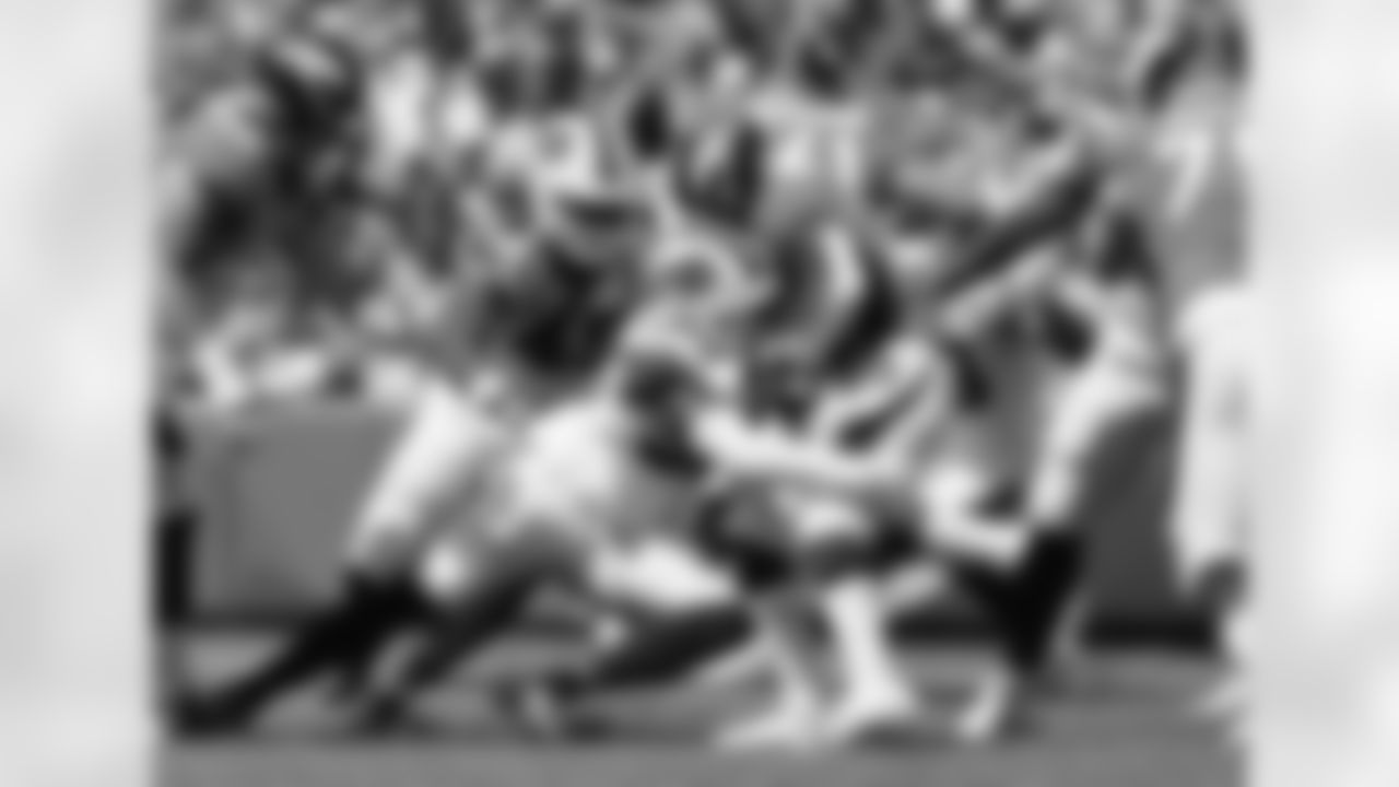 Shaq Lawson (90) and Tremaine Edmunds (49). Buffalo Bills vs Denver Broncos, Preseason Week 2, August 20, 2022 at Highmark Stadium. Photo by Bill Wippert