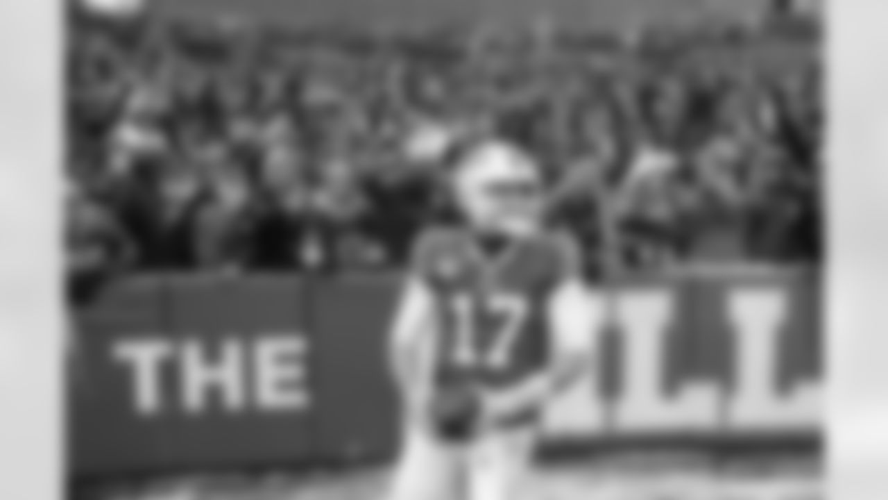 Josh Allen (17) touchdown celebration with fans. Buffalo Bills vs Atlanta Falcons at Highmark Stadium, January 2, 2022. Photo by Bill Wippert