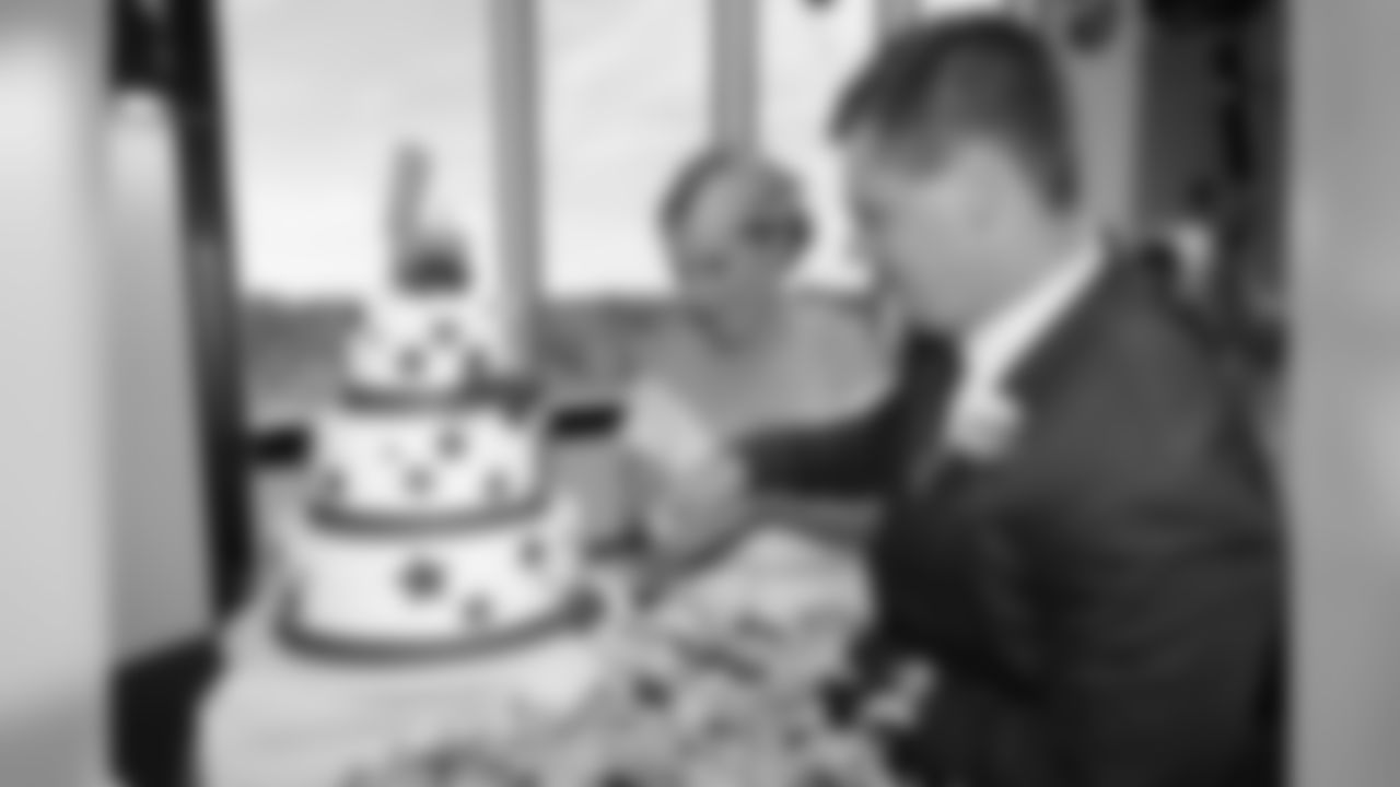The Buffalo Bills celebrate the marriage of Mackenzie Park and Jordan Binggeli, the winning couple from the “Halftime Wedding Experience of a Lifetime†contest, at New Era Field on September 29, 2019.
