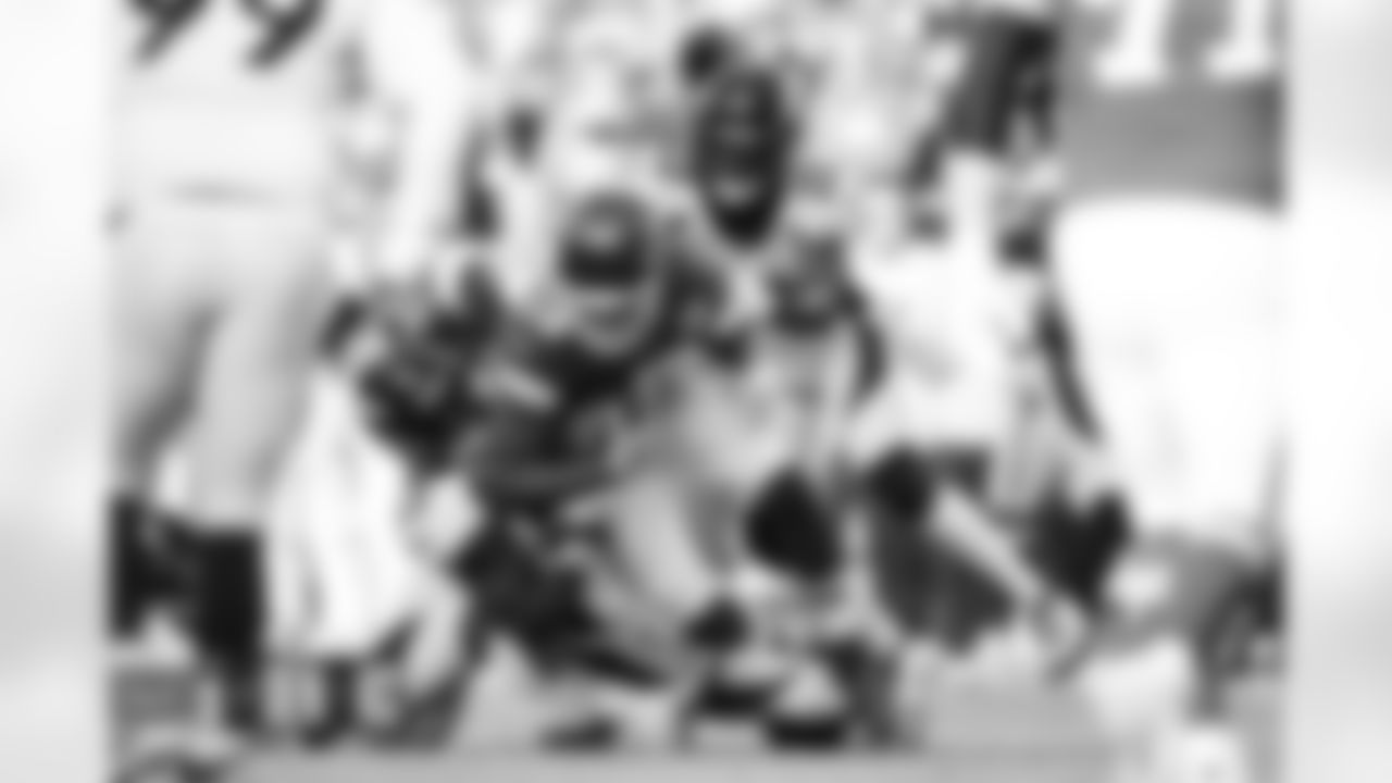 Jonathon Cooper and Kareem Jackson during the Broncos' Week 17 game against the Kansas City Chiefs at GEHA Field at Arrowhead Stadium in Kansas City, Missouri on January 1, 2023. Photo by Joshua Gateley