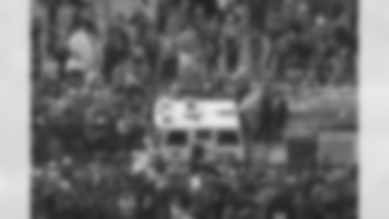 An estimated 350,000 fans turned out in downtown Denver and then on to City Hall to catch a glimpse of their back-to-back World Champion Broncos. Here, Pat Bowlen holds the Lombardi Trophy from atop a fire truck.