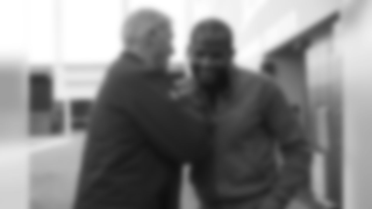 President of Football Operations/General Manager John Elway talks with Pro Football Hall of Fame and Broncos Ring of Fame cornerback Champ Bailey at practice on October 11, 2019 at UCHealth Training Center. (Photo by Ben Swanson)