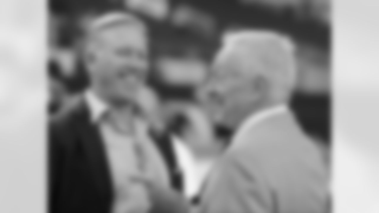 GM John Elway and Cowboys GM Jerry Jones
