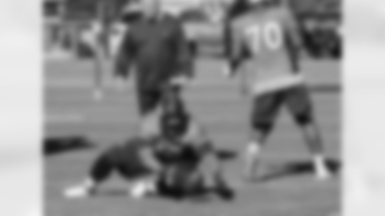 DT Sealver Siliga practices recovering fumbles.