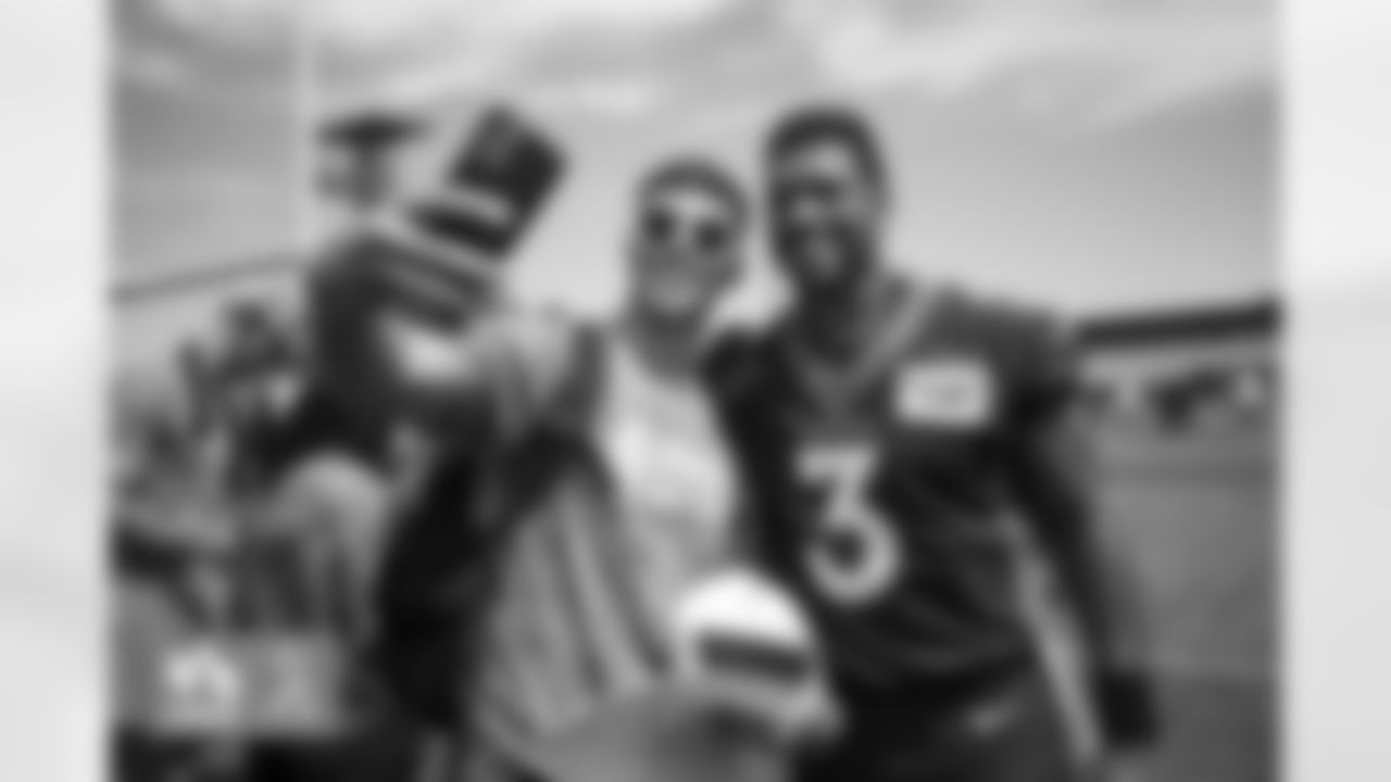 Russell Wilson during a USAA Salute to Service meet-and-greet session after practice at UCHealth Training Center in Englewood, Colorado on August 25, 2022. (Photo by Ben Swanson)