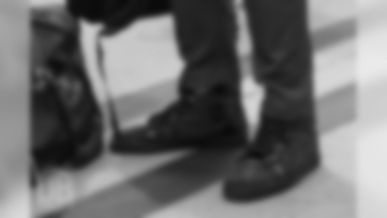 Fashionable shoes on the tarmac at Denver International Airport during the team's travel for their preseason game against the Washington Redskins on August 23, 2018.