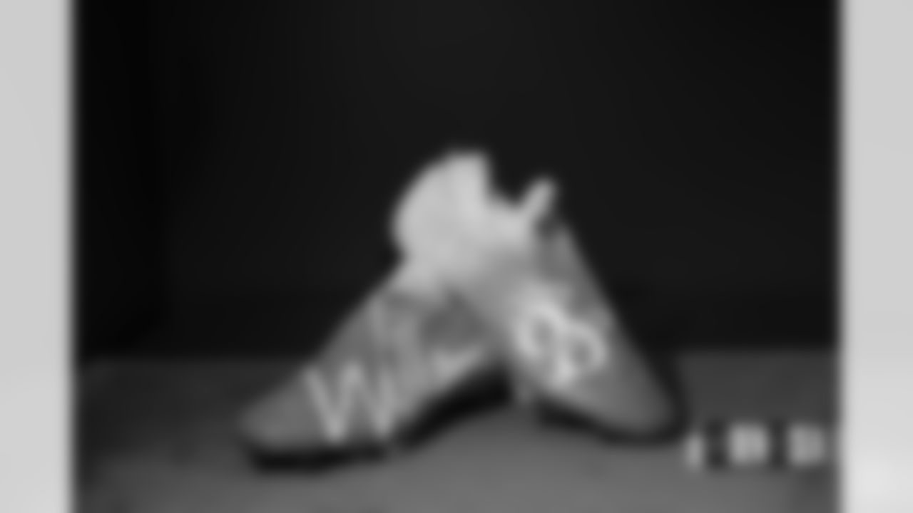 Javonte Williams's cleats in the locker room before the Broncos' Week 1 game against the Seattle Seahawks at Lumen Field in Seattle, Washington on September 12, 2022. (Photo by Gabriel Christus)