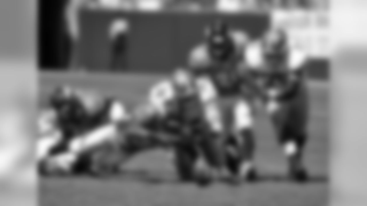 Linebacker Wesley Woodyard makes a fumble recovery against the San Francisco 49ers.