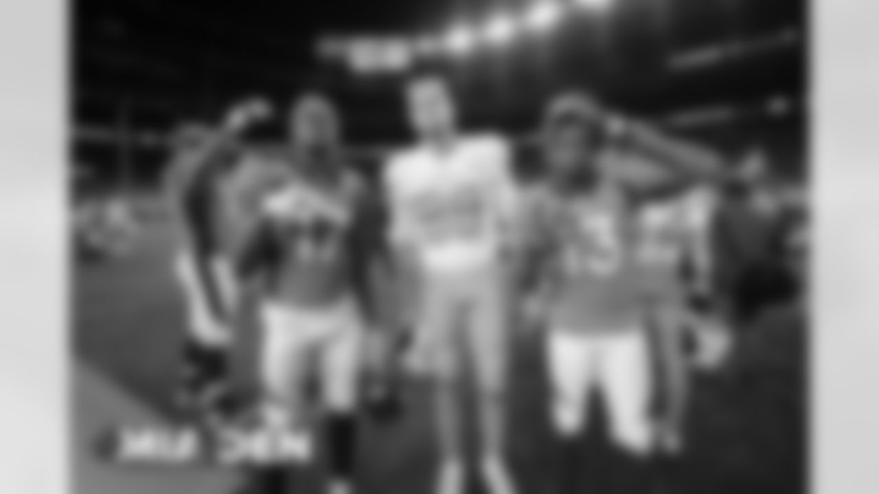 DaeSean Hamilton, Mike Gesicki and KJ Hamler after the Broncos' Week 11 game against the Miami Dolphins at Empower Field at Mile High in Denver, Colorado on November 22, 2020. (Photo by Gabriel Christus)