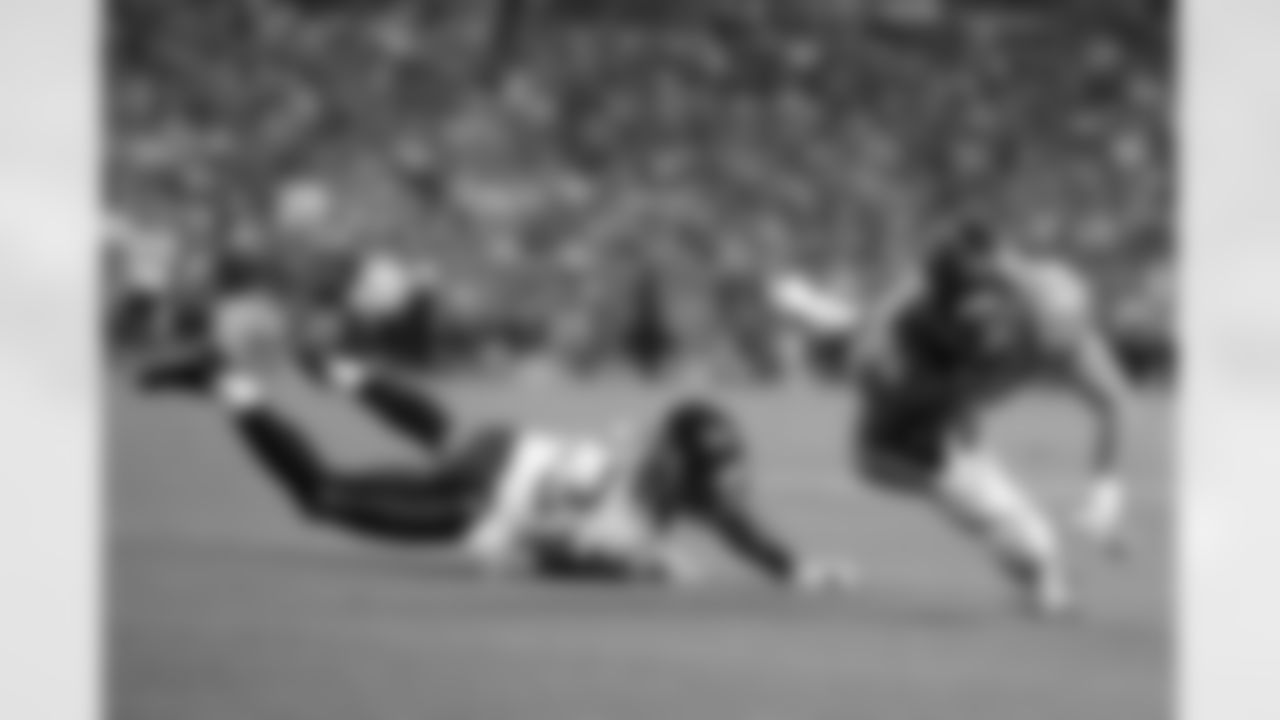 Tight end Jacob Tamme dives forward on one of his two first-half catches.