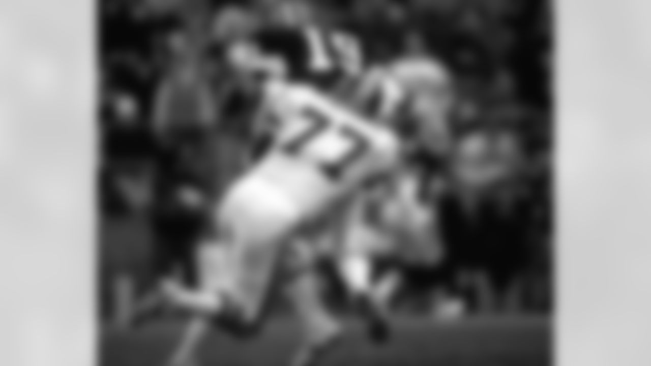 Linebacker Karl Mecklenburg sacks the Browns quarterback during a game in Cleveland.