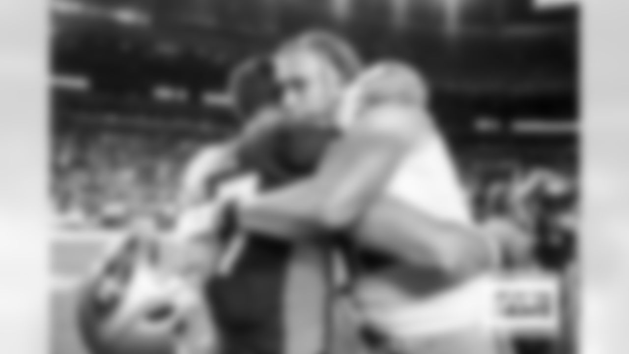 Josey Jewell and George Kittle after the Broncos' Week 3 game against the San Francisco 49ers at Empower Field at Mile High in Denver, Colorado on September 25, 2022. (Photo by Ben Swanson)