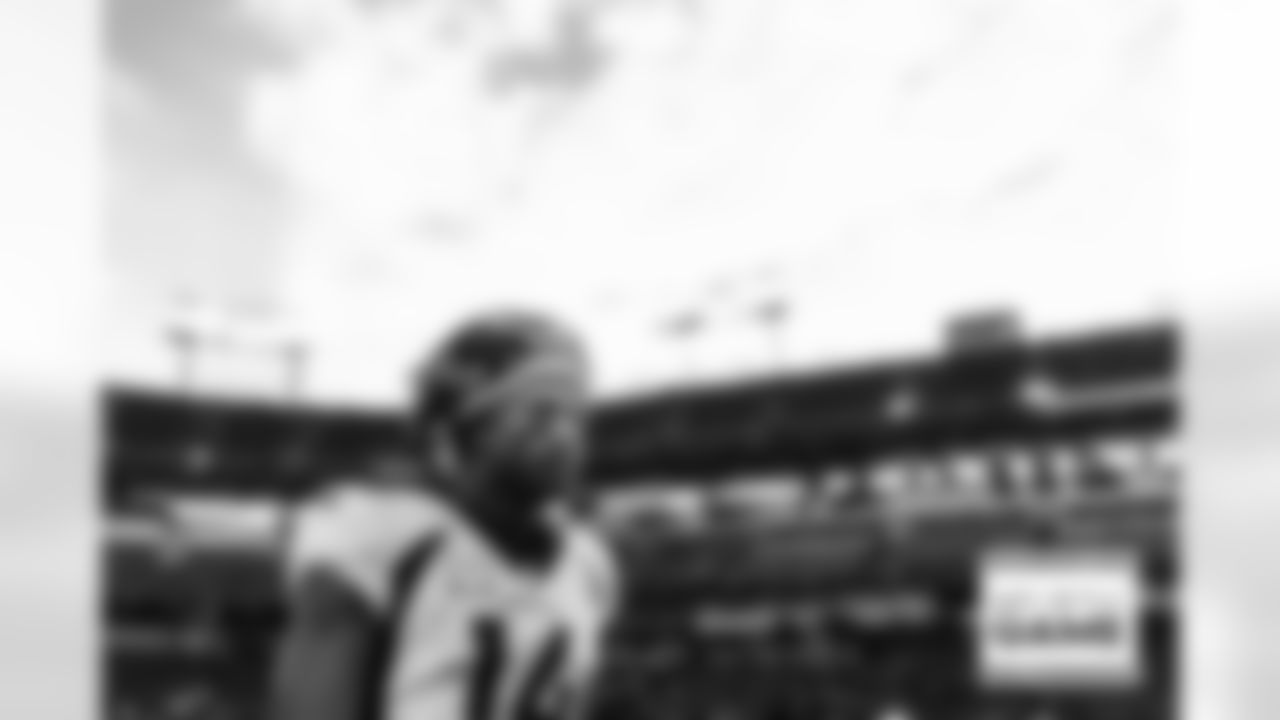 Courtland Sutton walks off the field at sunset after the Broncos' Week 10 game against the Tennessee Titans at Nissan Stadium in Nashville, Tennessee on November 13, 2022. (Photo by Ben Swanson)