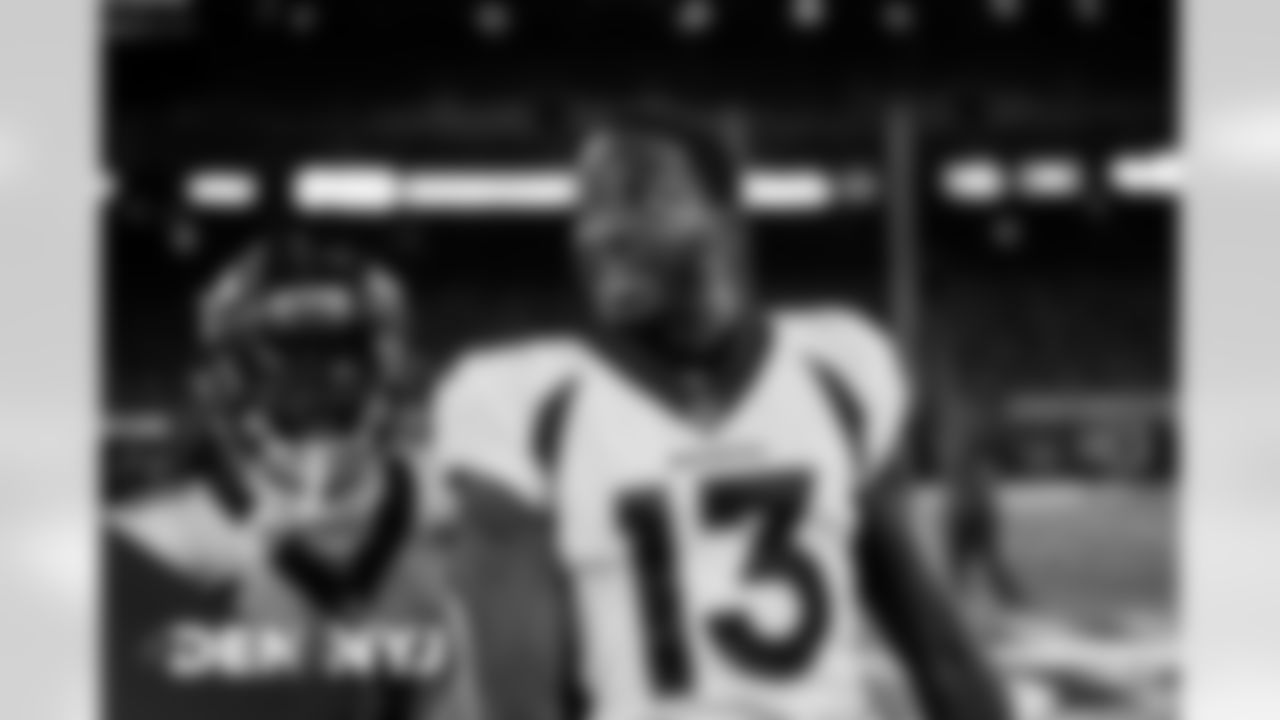 KJ Hamler and Diontae Spencer get amped up during pregame warmups before the Broncos' Week 4 game against the New York Jets at MetLife Stadium in East Rutherford, New Jersey on October 1, 2020. (Photo by Ben Swanson)