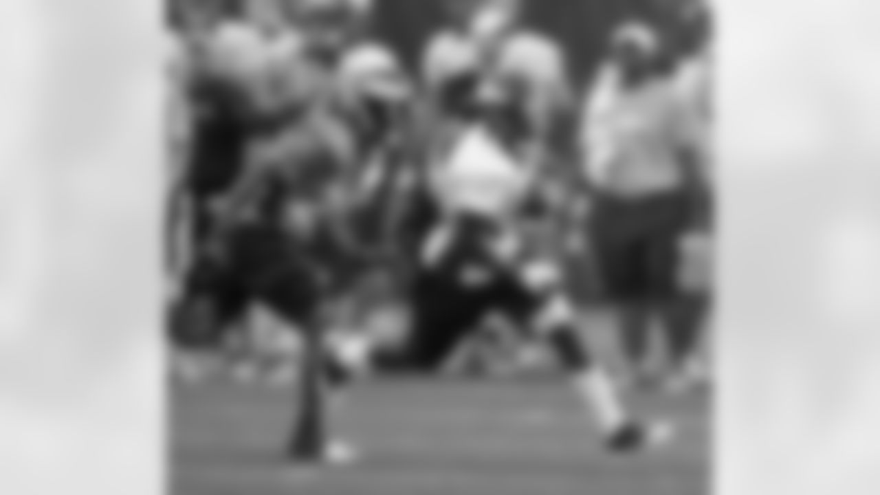 RB Ronnie Hillman carries the ball during drills.