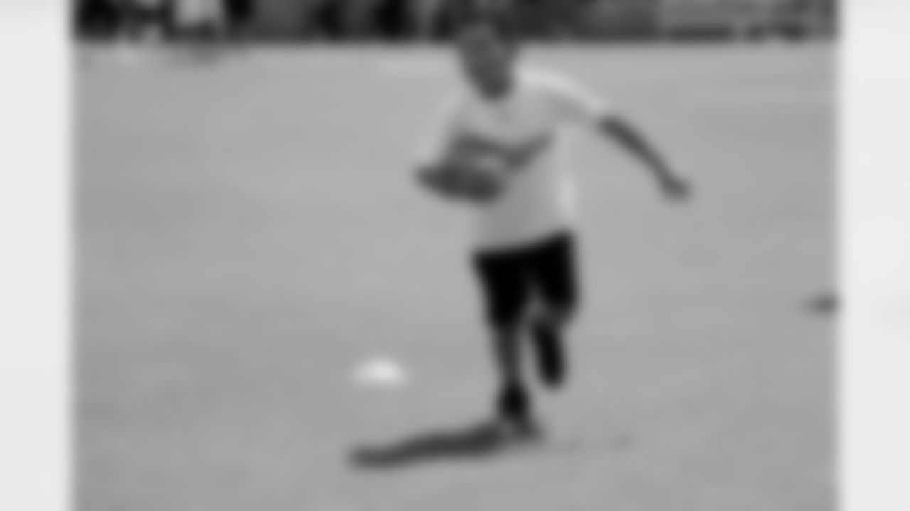 Kids of all ages participated in a series of drills to help them learn and understand proper football fundamentals.