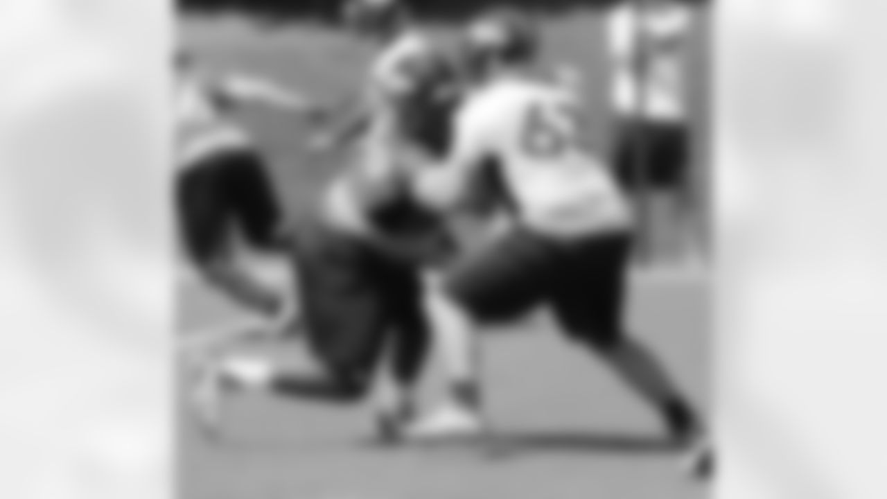 Guard Ben Garland single-blocks Williams.