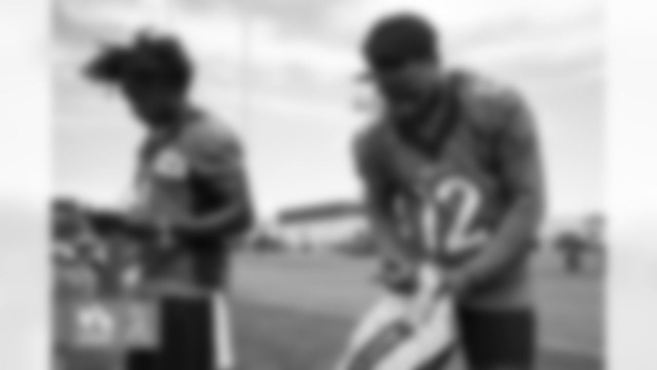 KJ Hamler and Montrell Washington during a USAA Salute to Service meet-and-greet session after practice at UCHealth Training Center in Englewood, Colorado on August 25, 2022. (Photo by Ben Swanson)