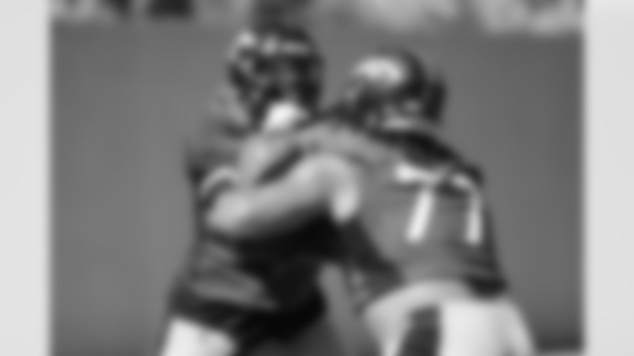 Lloyd Cushenberry III and Quinn Meinerz during the ninth day of OTA practices at UCHealth Training Center on June 9, 2021. (Photo by Ben Swanson)