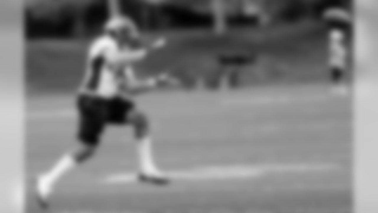 CB Coryell Judie looks in an interception.
